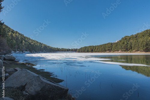 In Winter the Frozen Lake of Engolasters, Encamp, Andorra.