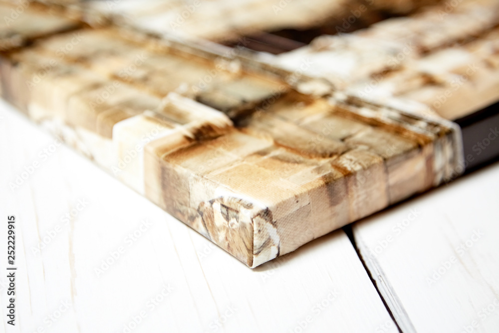 Gallery wrap, photo print on canvas and stretched on wooden stretcher bar, closeup, selective focus Gallery wrap, photo print on canvas and stretched on wooden stretcher bar, closeup, selective focus