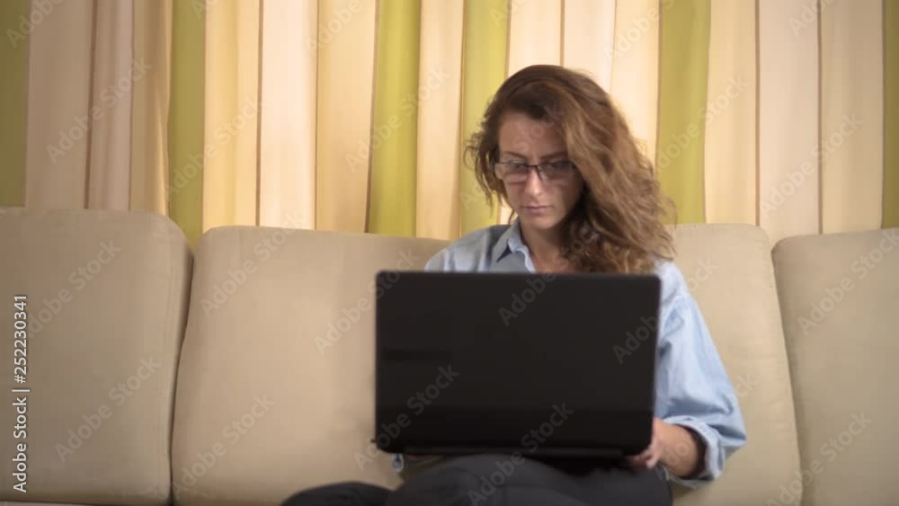 Stylish woman working from home in her home office Stylish woman working from home in her home office