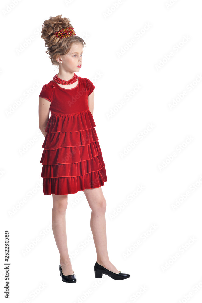 Portrait of cute girl in red dress posing isolated Portrait of cute girl in red dress posing isolated