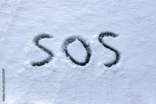 "SOS" written in the snow © ibraman3012