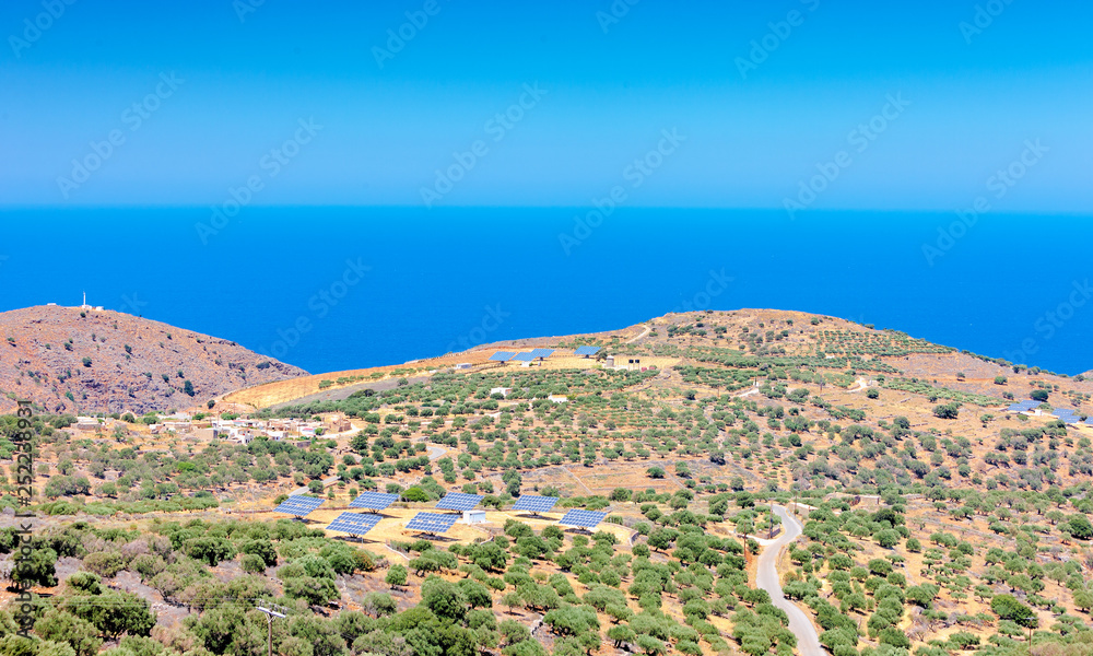 Solar panels in olive grove. Crete. Greece