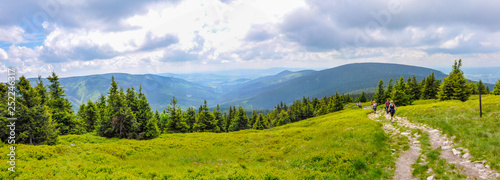 Принти на полотні Tourists with backpacks on the trail, mountain hostel, Snieznik Mountains, Krali