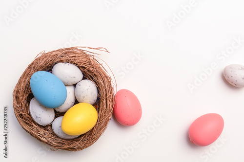 Easter eggs on white background with copy space
