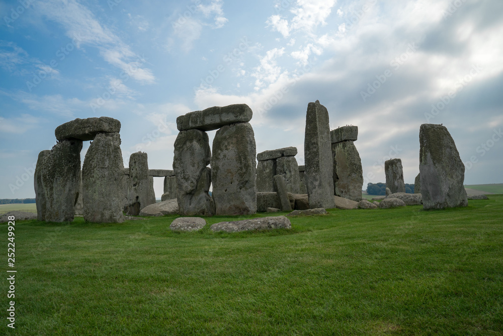 Stonehenge on a sunny day with some cloud cover