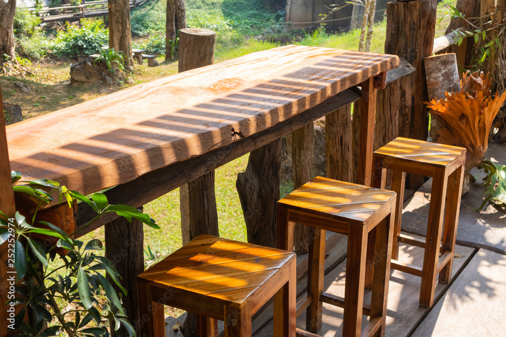 table scene and tree in background at coffee cafe