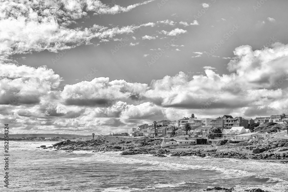 Coastal scene with houses in Yzerfontein. Monochrome