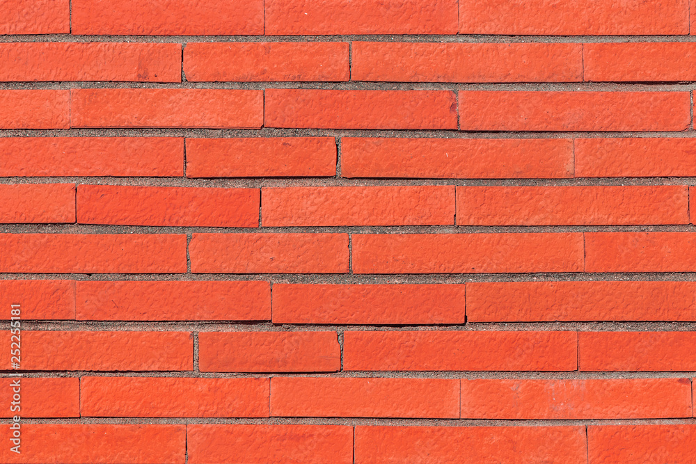 Obraz premium Red brick wall texture. Architectural detail, closeup. Material background.