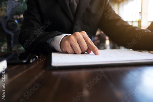 Businessmen calculate earnigs business performance, business concept . photo