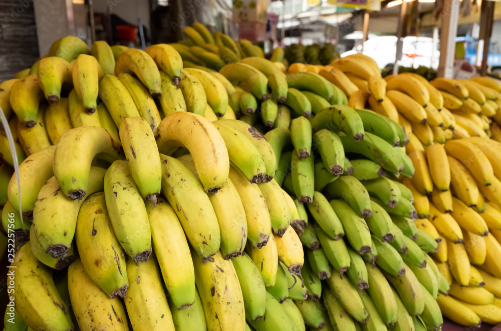 banana fruit stacked on the marketplace