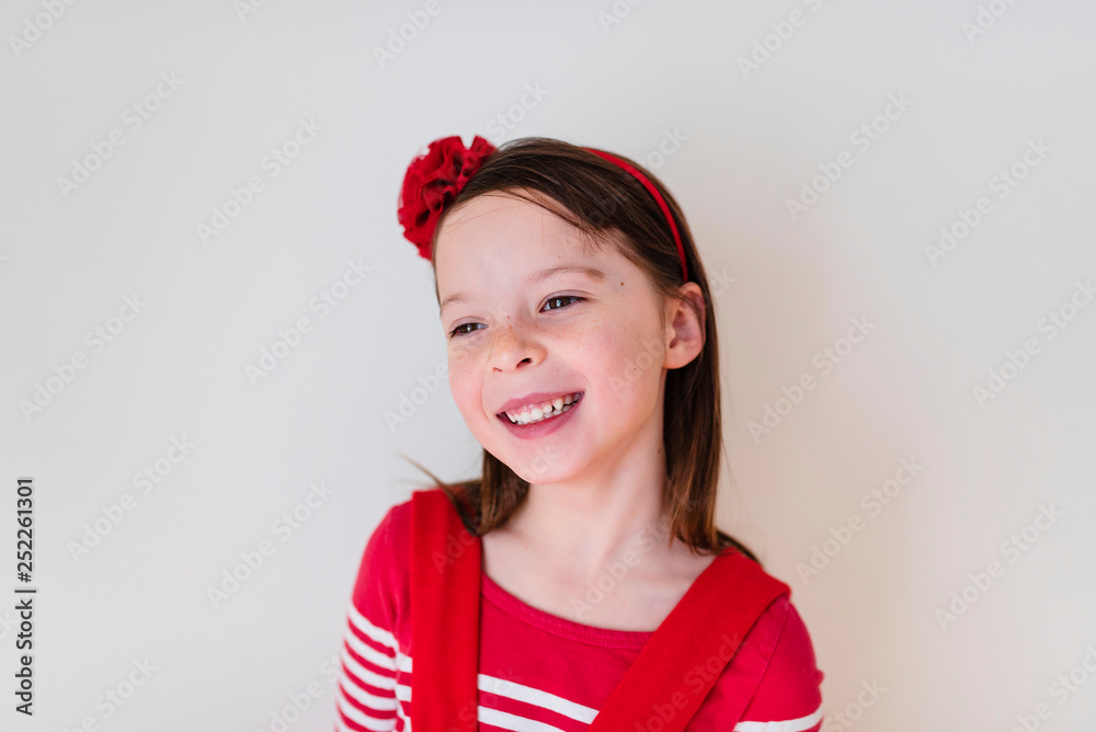 Portrait of young girl wearing red Portrait of young girl wearing red