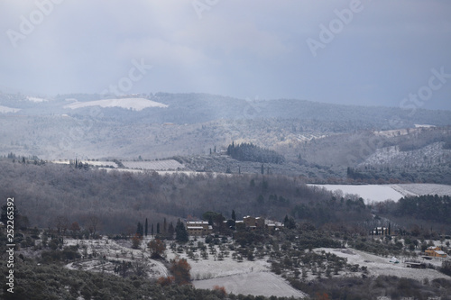 The Chianti landscape in the Tuscan hills after a winter snowfall. Chianti, Tuscany, Italy