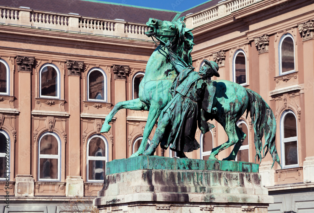 Statue of the horseherd taming a wild horse near royal palace, Budapest