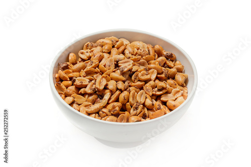 Roasted peanuts in a plate on a white background