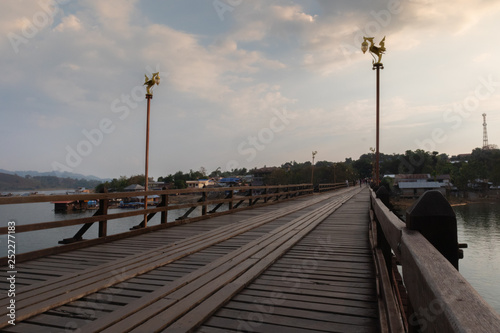 landscape scene Wooden Mon Bridge at kanchanaburi, Thailand © moxumbic