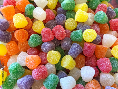 Canvastavla top view flat lay background bright red, yellow and yellow Natural Fruit gum dro