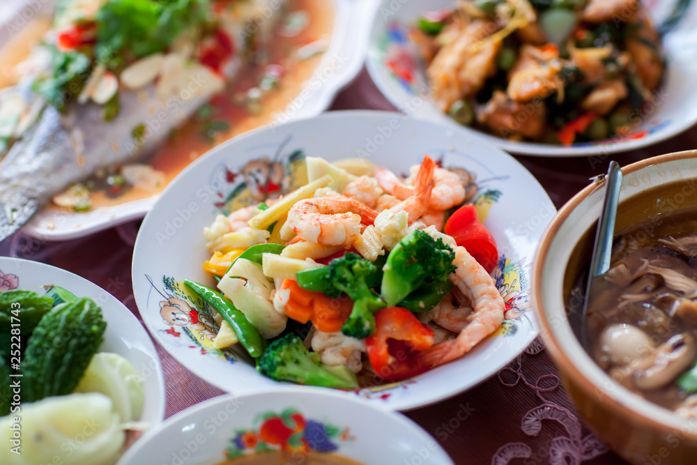 Close up chinese shrimp fried with vegetable in chinese food set, set of foods in wedding ceremony Close up chinese shrimp fried with vegetable in chinese food set, set of foods in wedding ceremony