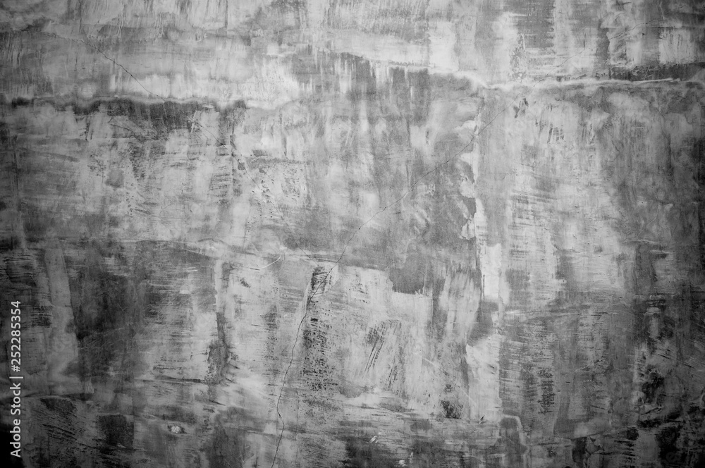 Fototapeta premium Wall panel grunge black,dark grey concrete with light background.Dirty,dust grey,black wall concrete backdrop texture and splash or abstract background.Panel street image backdrop.