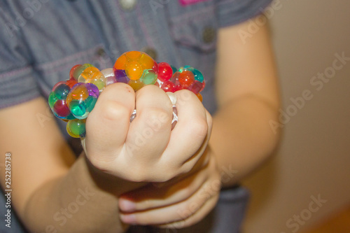 Antistress in the hands. Girl and anti-stress