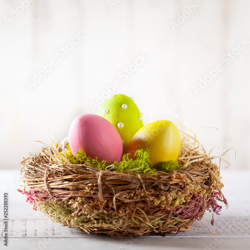 Easter composition with Easter eggs in nest.