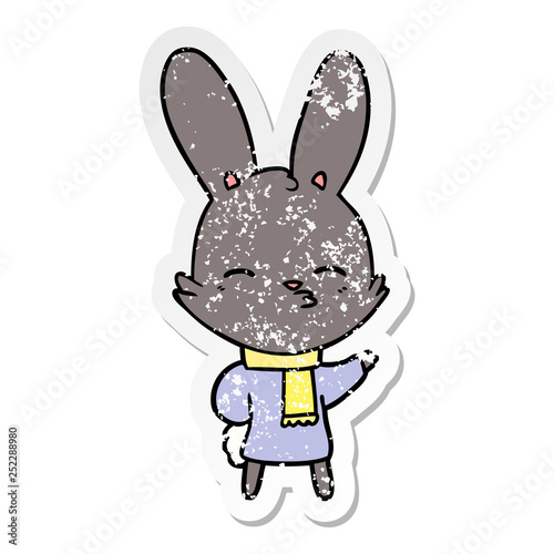 distressed sticker of a curious bunny cartoon