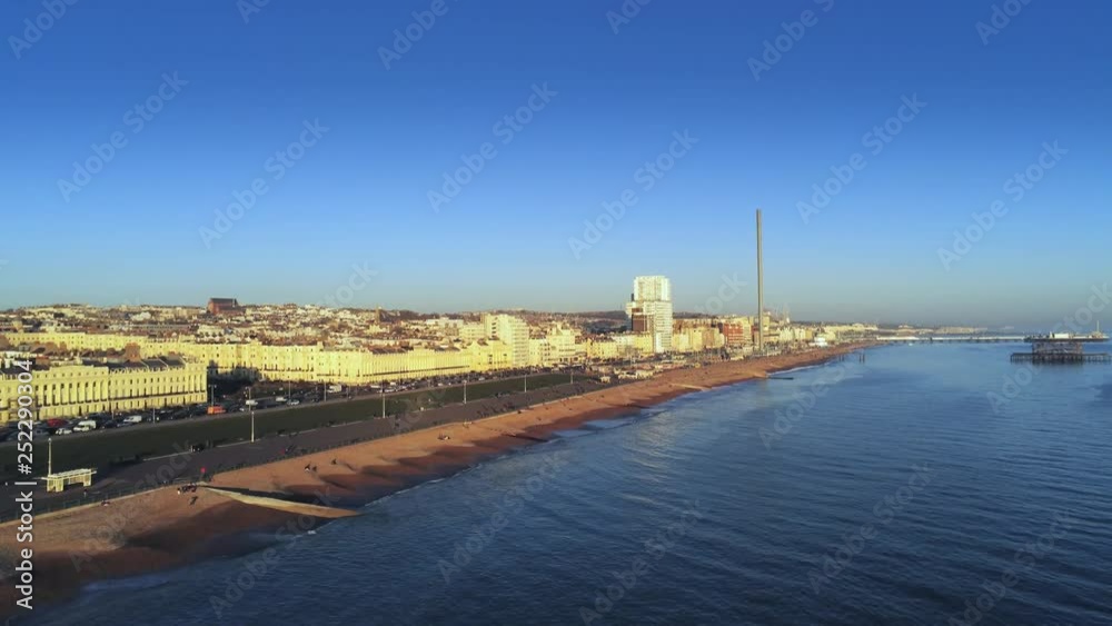 Flight along Brighton Beach England at sunset Flight along Brighton Beach England at sunset