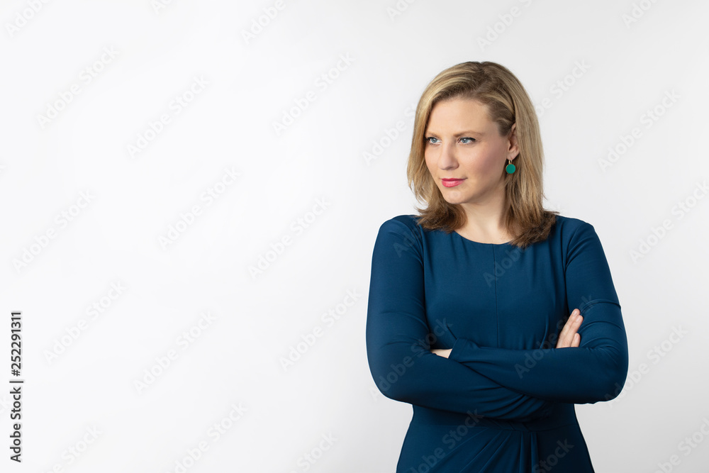 Beautiful Blonde Woman Posing in Blue Dress on White Background Beautiful Blonde Woman Posing in Blue Dress on White Background