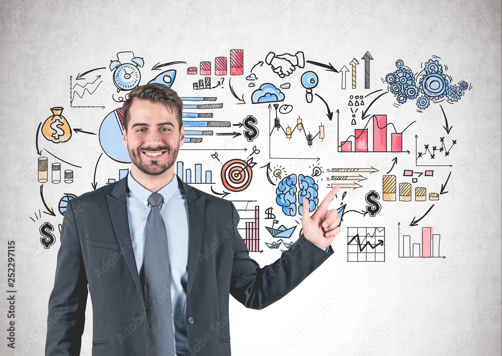 Smiling businessman pointing at business strategy Smiling businessman pointing at business strategy