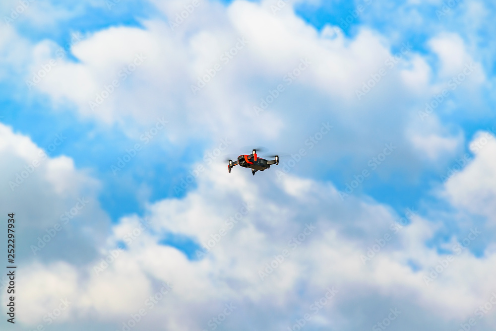 Drone at Cumulus Sky Background Drone at Cumulus Sky Background