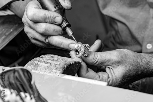hands of jewelry technician
