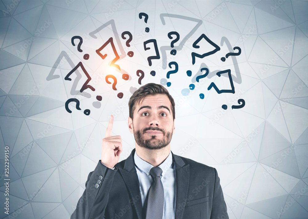 Businessman with idea, question marks Businessman with idea, question marks