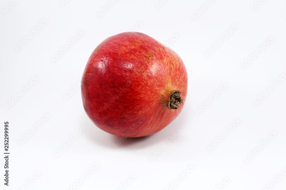 pomegranate isolated on a white background pomegranate isolated on a white background