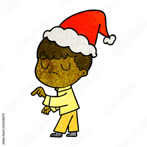textured cartoon of a grumpy boy wearing santa hat