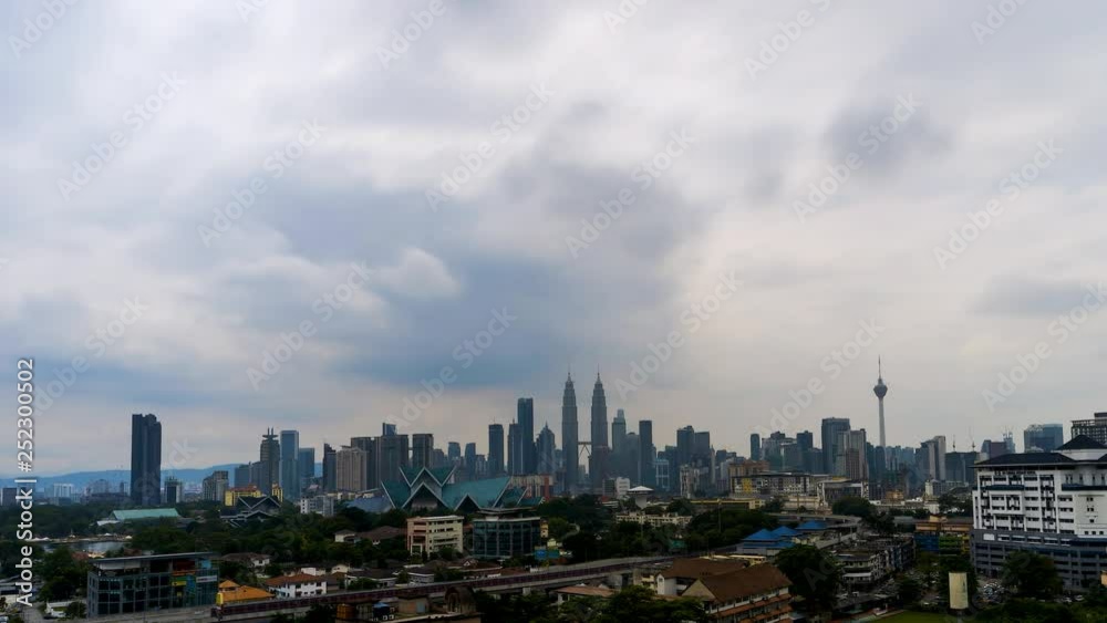 kuala lumpur skyline with dramatic cloud. kuala lumpur skyline with dramatic cloud.