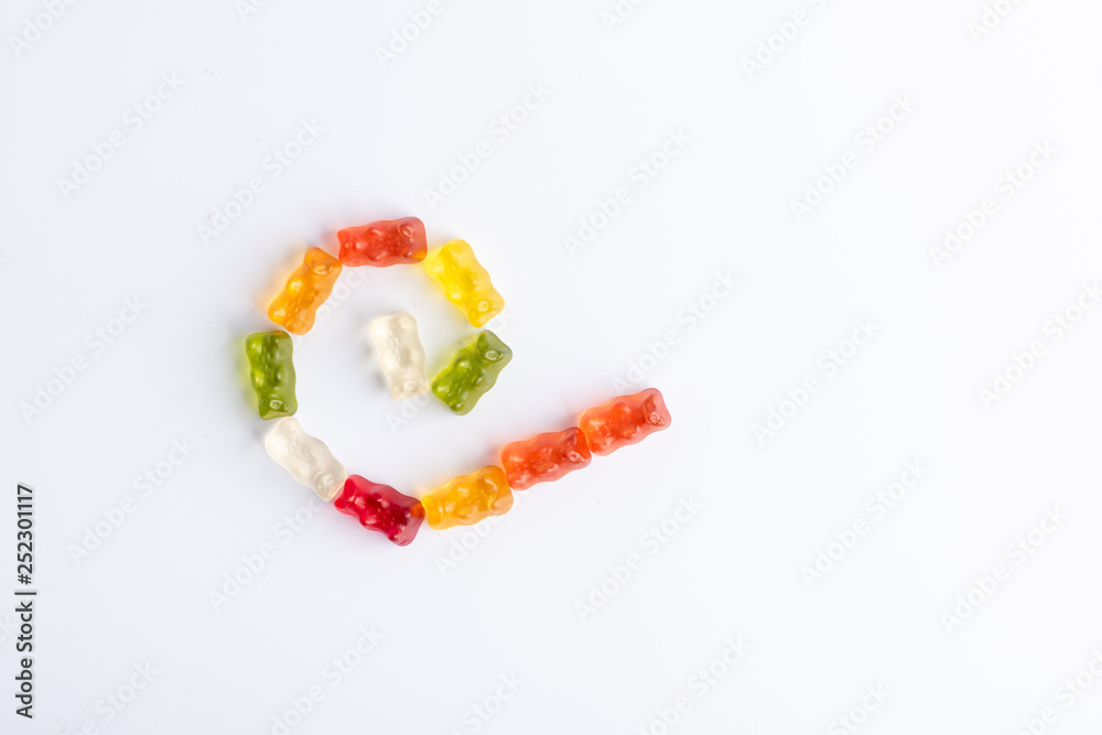spiral jelly bears, different colors on white background spiral jelly bears, different colors on white background