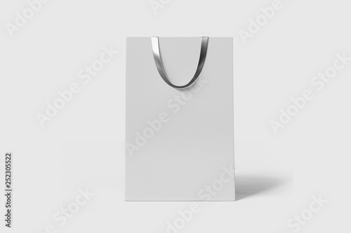 White paper shopping bag Mock-up on soft gray background.Сan be used for design and branding