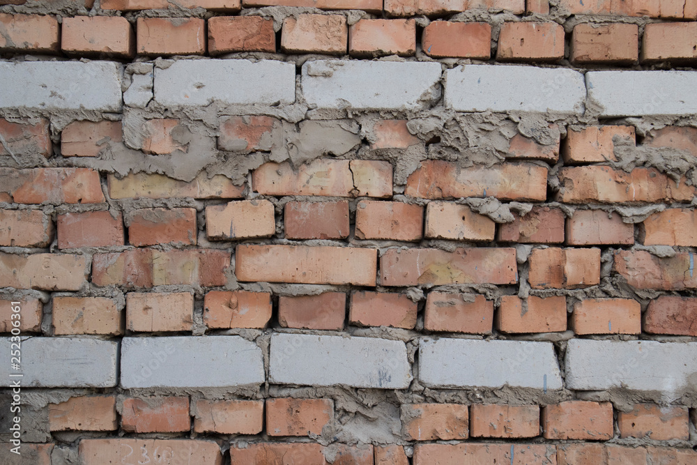 Obraz premium Brick texture with scratches and cracks