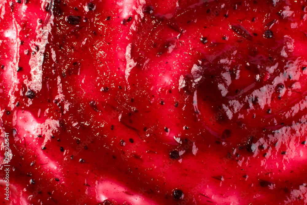 Dark Red Berry Jam Spreaded on Flat Background or Dark Red Berry Jam Spreaded on Flat Background or