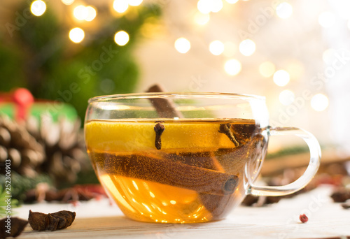 Winter drink with spices on festive new year background