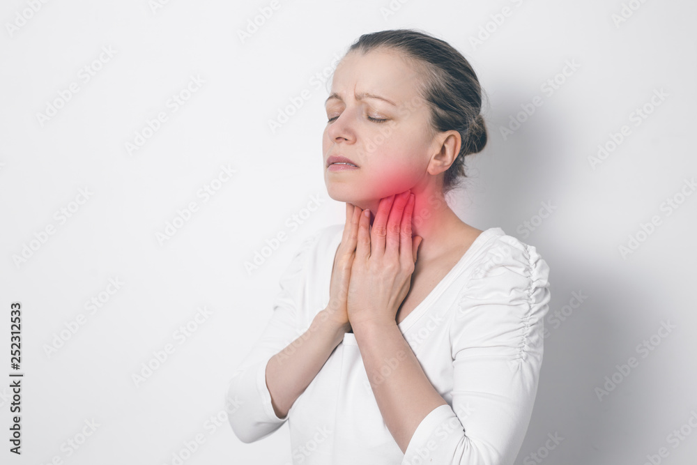 The woman has a thyroid disorder. Sore throat. Inflamed glands. The woman has a thyroid disorder. Sore throat. Inflamed glands.