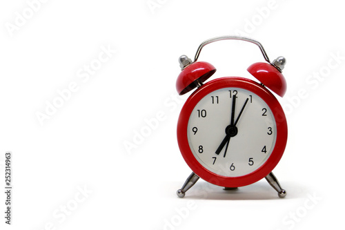 Red clock on white background.