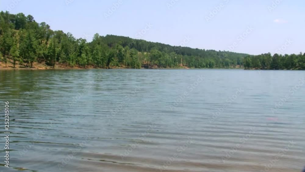 Quiet peaceful lake on a beautiful, clear, summer day just outside of Birmingham, AL Quiet peaceful lake on a beautiful, clear, summer day just outside of Birmingham, AL