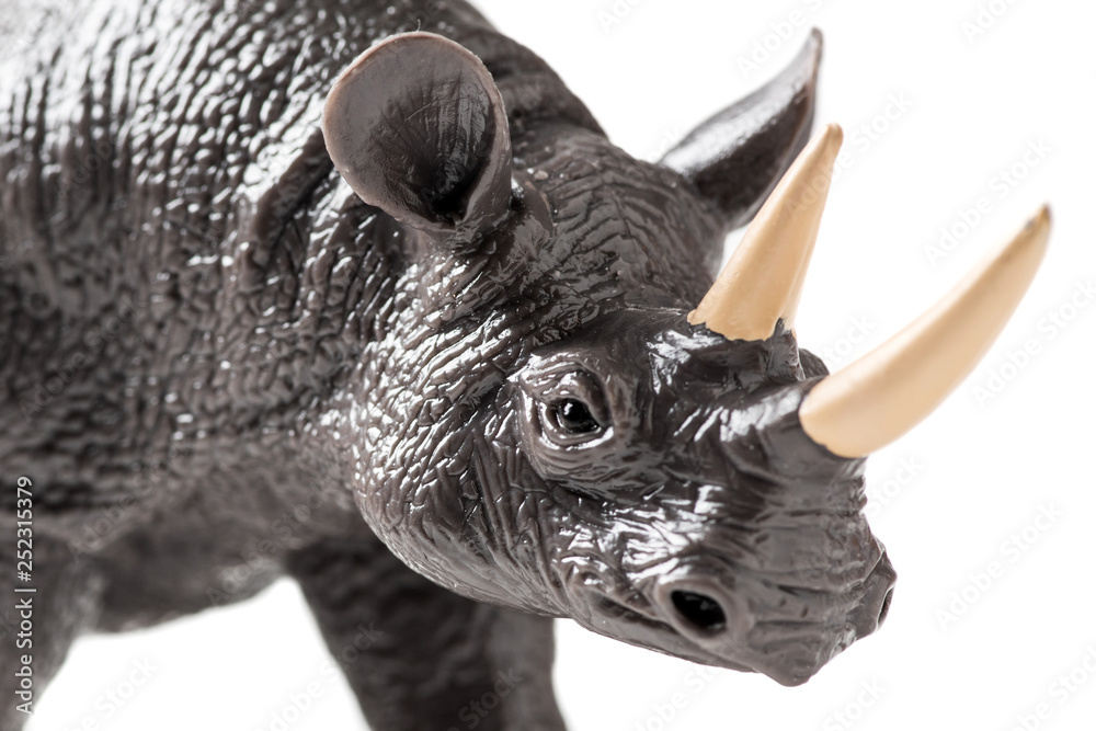 Fototapeta premium Rhino plastic figurine on white background