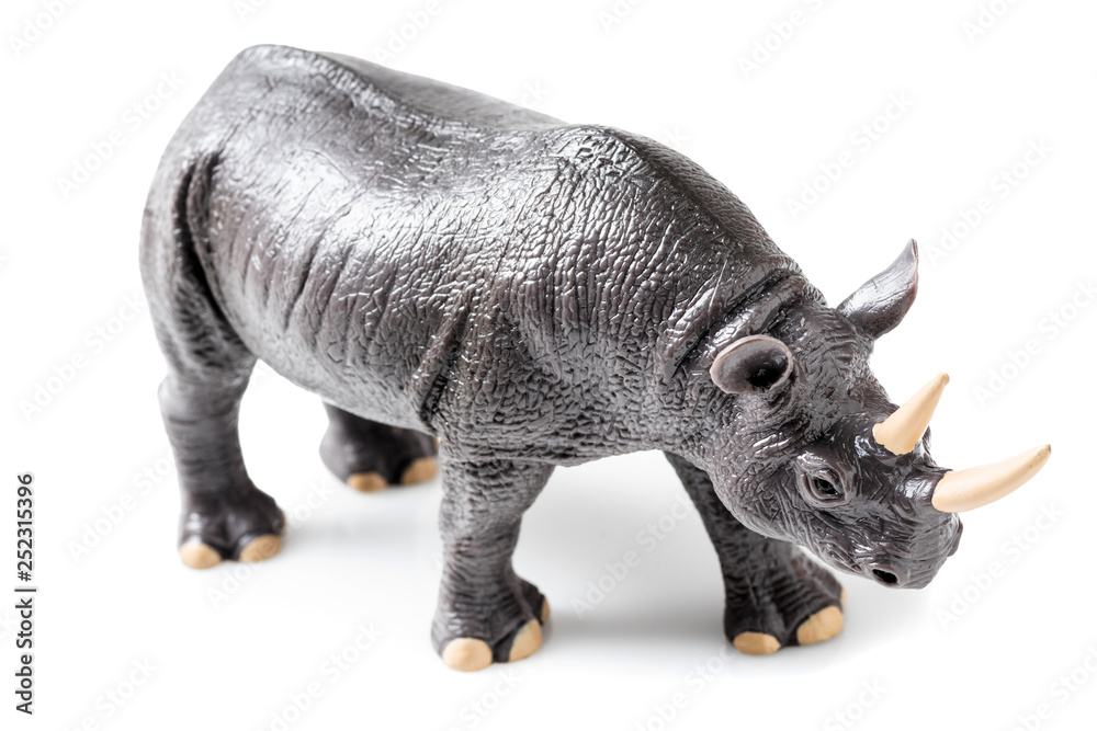 Fototapeta premium Rhino plastic figurine on white background