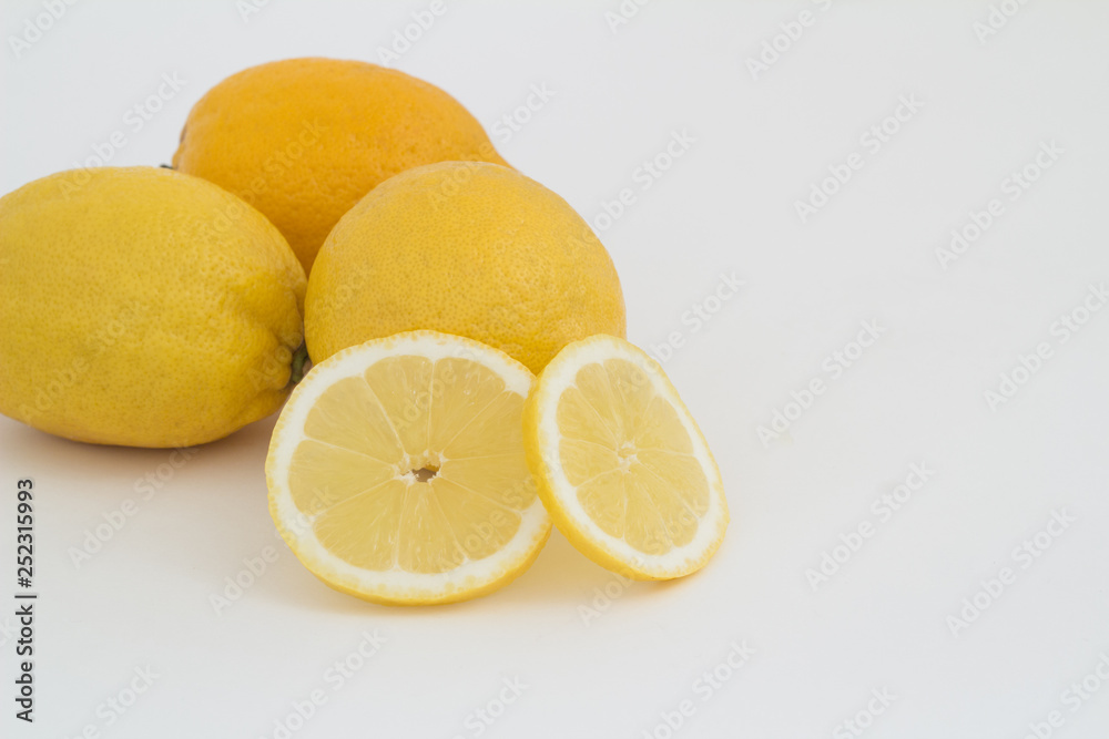 Lemon on a white background and in a cut. Lemon on a white background and in a cut.