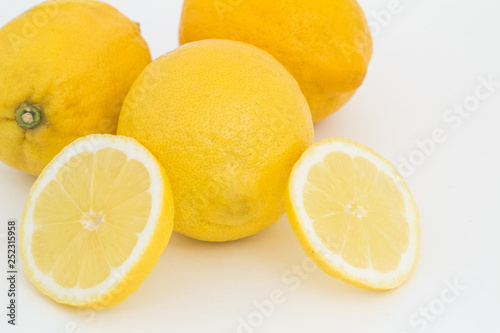 Lemon on a white background and in a cut.