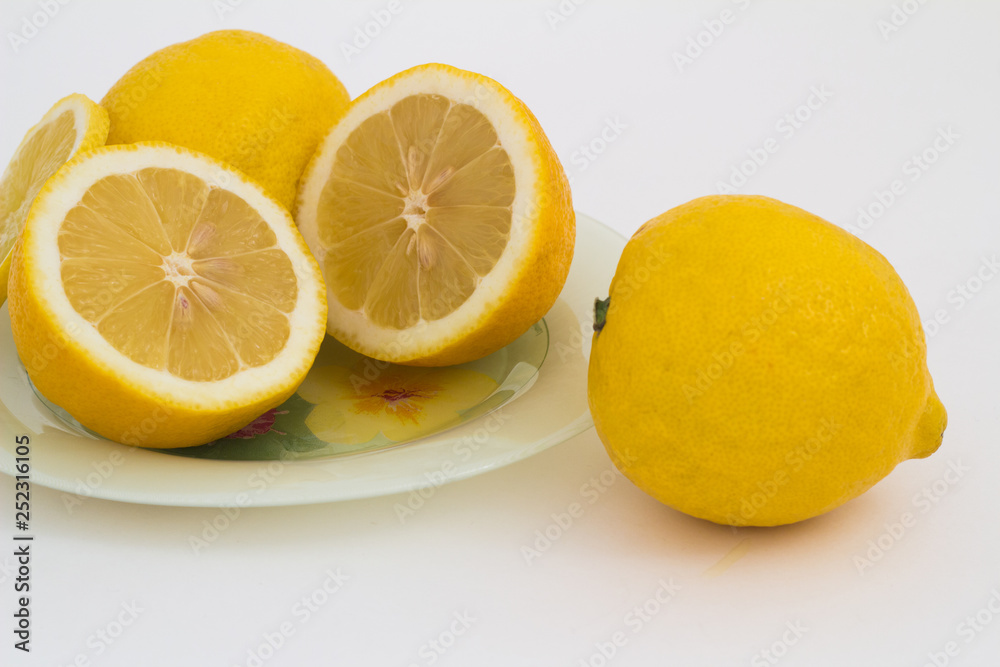 Lemon on a white background and in a cut. Lemon on a white background and in a cut.