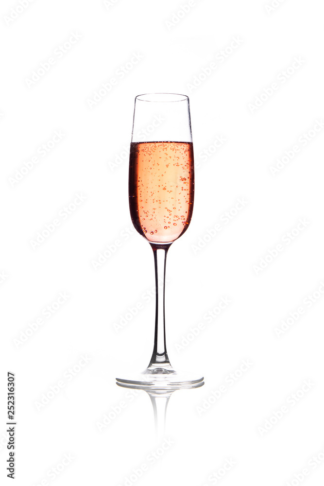 Rose pink champagne glass with bubbles isolated on white background Rose pink champagne glass with bubbles isolated on white background