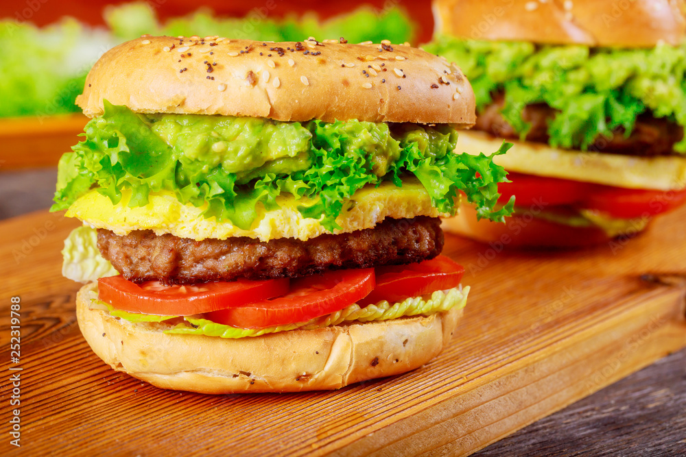 Juicy hamburger with lettuce and tomato fries homemade Juicy hamburger with lettuce and tomato fries homemade