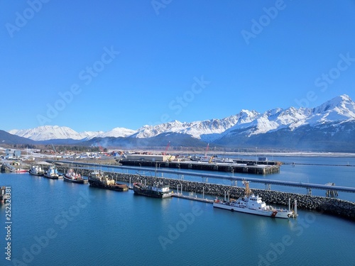 Coast Guard ship, tugboats, and commercial fishing boats in Alaska 